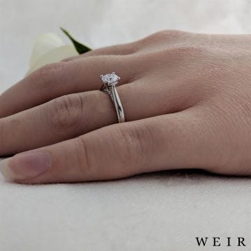 Platinum round brilliant cut diamond engagement ring