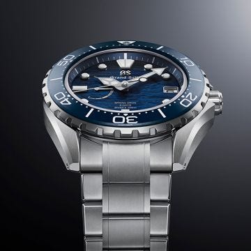 Photo of the Grand Seiko Evolution 9 Collection Diver’s 43.8mm watch with a blue dial, 5-day Spring Drive movement, and titanium case (Model SLGA023G