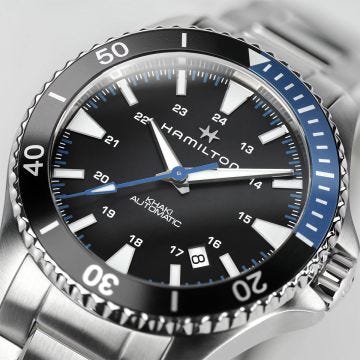 Photo of the Hamilton Khaki Navy Scuba Auto 40mm Watch with a navy blue dial, luminous hands, stainless steel case, and automatic movement, designed for durability and underwater performance.