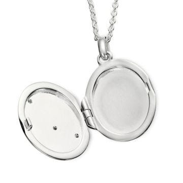 Make cherished memories with the Silver Taylor Diamond Star Pattern Locket, the ideal gift for christening or communion. This locket features a stunning diamond star pattern design, symbolizing guidance and protection