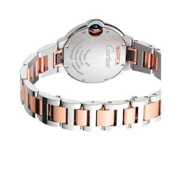 Photo of the Cartier Ballon Bleu 33mm Silver Dial Automatic Watch W2BB0032, featuring a fluted crown set with a blue cabochon, silver guilloché dial with Roman numerals, and a two-tone stainless steel and rose gold bracelet