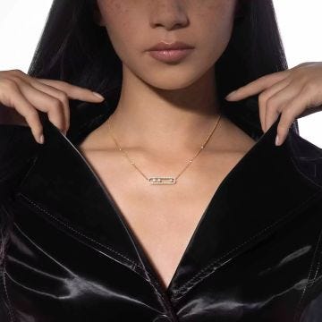 Photo of the Messika 18K Yellow Gold Move Pavé Diamond Necklace 03994-YG featuring exquisite diamonds and a radiant gold design for an elegant look