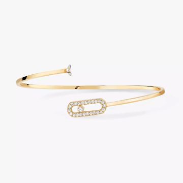 Photo of the Messika 18K Yellow Gold Move Uno Pavé Flex Diamond Bangle 11134-YG featuring a flexible design adorned with sparkling pavé diamonds