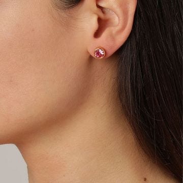 Photo of the Dyrberg/Kern Nobles Gold Plated Stud Earrings 440191, showcasing soft rose-toned crystals set in polished gold plating for a feminine and elegant finish.