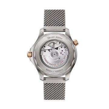 Photo of the Omega Seamaster Diver 300M 42mm watch (210.90.42.20.10.001) with a green ceramic dial, automatic movement, and a titanium and rose gold case