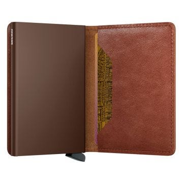 Photo of the Secrid Slimwallet Vintage Cognac Brown (SV-Cognac-Brown). Close-up image of the slim, cognac brown wallet, highlighting its vintage leather finish and secure card storage.