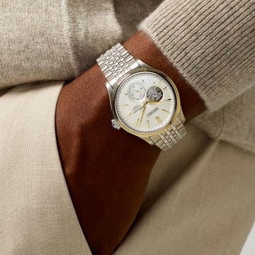 Photo of the Seiko Presage Classic Open Heart 40.2mm Cream Dial Automatic Stainless Steel Watch (SPB480J1), highlighting its elegant open-heart design and sophisticated cream dial.