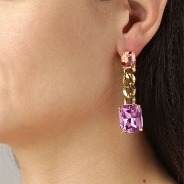 Photo of the DYRBERG/KERN Calla Gold Tone Drop Earrings adorned with peach and rose crystals