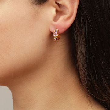Photo of the DYRBERG/KERN Heidi Gold Tone Hoop Earrings adorned with peach and rose crystals 440166