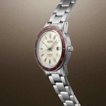 Photo of the Seiko Presage Style60's 40.8mm watch (SRPH93J1) with a white dial, automatic movement, and a stainless steel case, combining retro charm with contemporary precision.