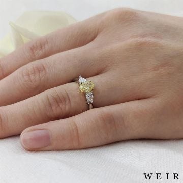 Platinum 0.57ct Fancy Light Yellow VS1  Oval cut Diamond Engagement Ring