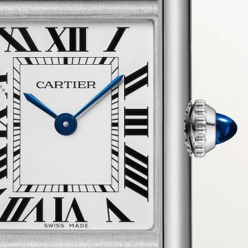Photo of the Cartier Tank Must 20.5 x 22mm Silvered Dial Solar Movement Watch WSTA0119, featuring a classic rectangular case, silvered dial with Roman numerals, and a black leather strap