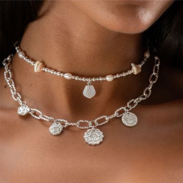 Chlobo Spirit of Bali Sterling Silver Charm Necklace SNTACMUL4, featuring a collection of handcrafted charms inspired by the spirit and culture of Bali, suspended from a delicate sterling silver chain.