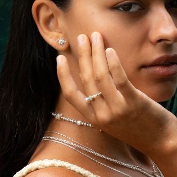 Chlobo Sunrise Glow Sterling Silver CZ Stud Earrings SEST3544, featuring sparkling cubic zirconia stones in a radiant sun-inspired design on polished sterling silver.