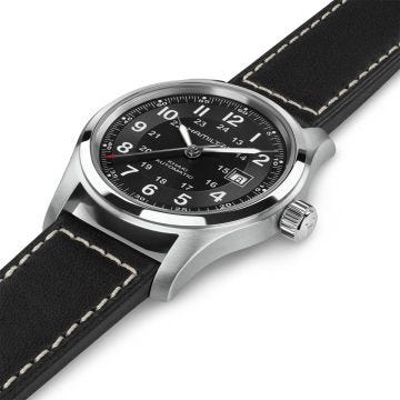 Photo of the Hamilton Khaki Field 42mm Black Dial Automatic Watch H70605733, featuring a bold black dial, day-date display, luminous hands, and a classic black leather strap
