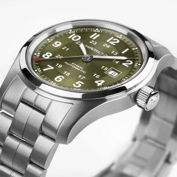 Photo of the Hamilton Khaki Field 42mm Green Dial Automatic Watch H70605160, featuring a striking green dial, day-date function, luminous hands, and a durable stainless steel bracelet