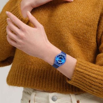 Photo of the Swatch Jammy Grape Dream 34mm blue dial quartz watch with gradient dark blue silicone strap, model SS08I10