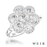 Platinum and round brilliant cut diamond engagement ring