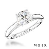 Platinum and round brilliant cut diamond engagement ring