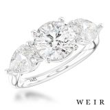 Platinum round brilliant cut diamond engagement ring