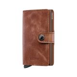 Photo of the Secrid Miniwallet Vintage Cognac Brown (MV-Cognac-Brown). Close-up image of the rich cognac brown wallet