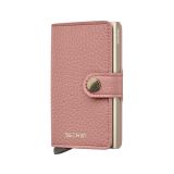 Photo of the Secrid Miniwallet Pebble Rose (MPe-Rose). Close-up image of the rose-coloured wallet, showcasing its textured finish and secure card storage mechanism.