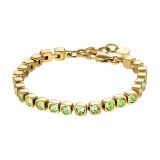 Photo of the DYRBERG/KERN Cory Bracelet (460089) featuring a radiant gold-tone finish with shimmering green crystals